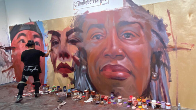 Robert Vargas paints a mural